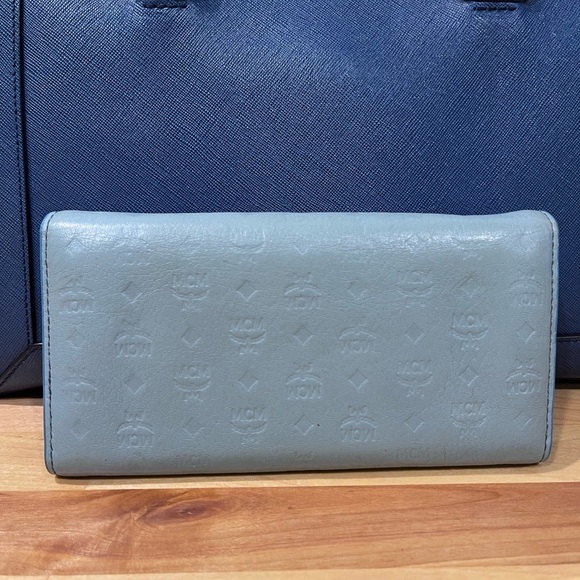 MCM Munchen trifold wallet in new condition except scratches on name plate. - Picture 2 of 15